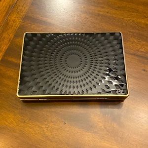 New! W/tags. Glossy black snap purse with gold chain